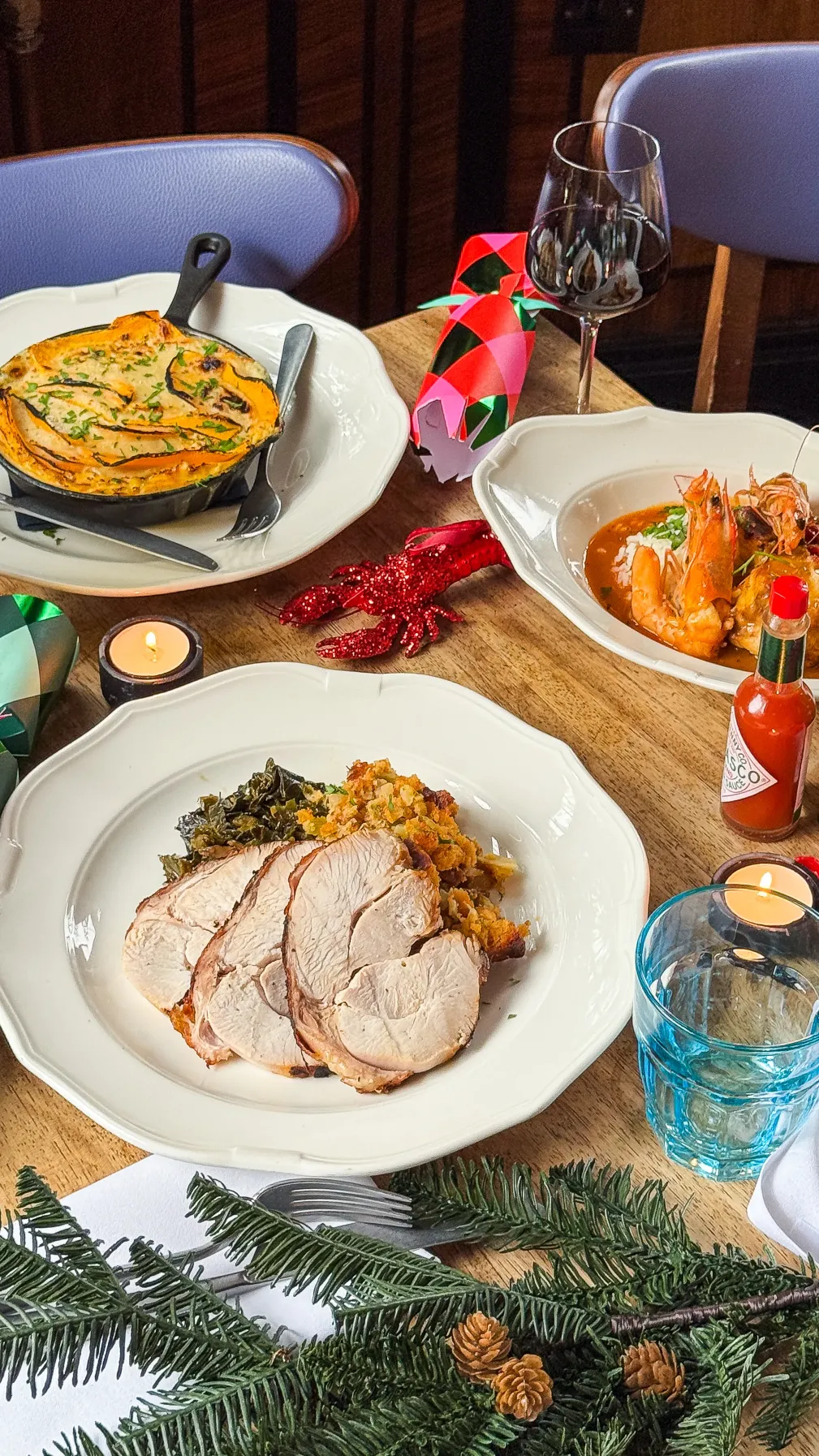 Christmas dinner at Plaquemine Lock, Islington Creole Christmas dinner at Plaquemine Lock in Islington with roast turkey, shrimp, pumpkin omelette and festive crackers